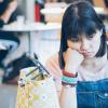 Girl with no lunch sitting at school table